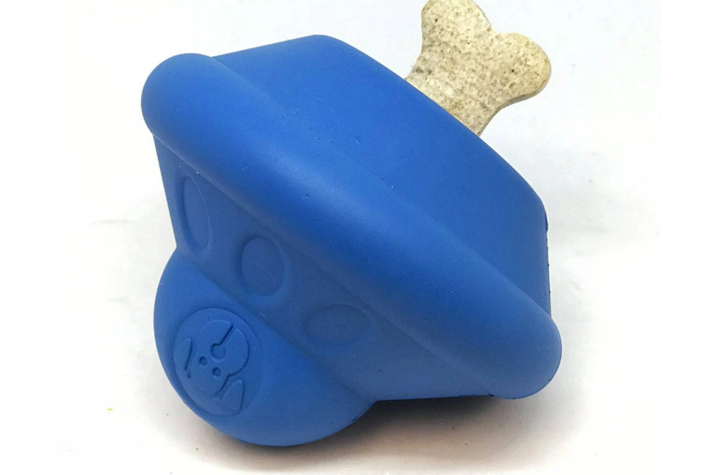 Blue dog toy with a bone-shaped treat on a white background